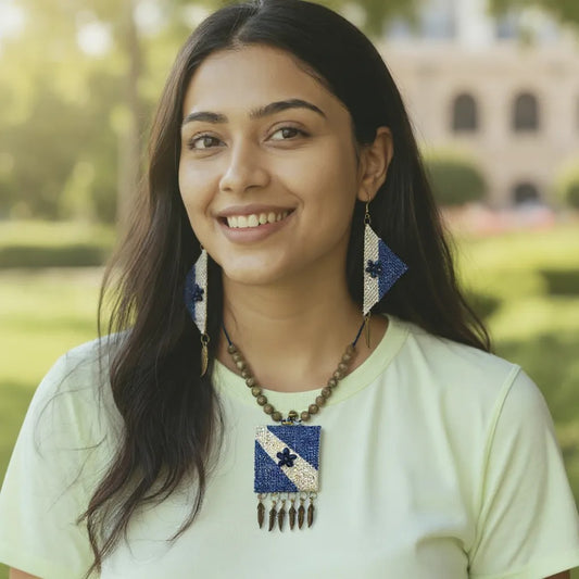 Neel-e-Noor model wearing blue and ivory handcrafted fabric necklace set with earrings – Grace of Awadh