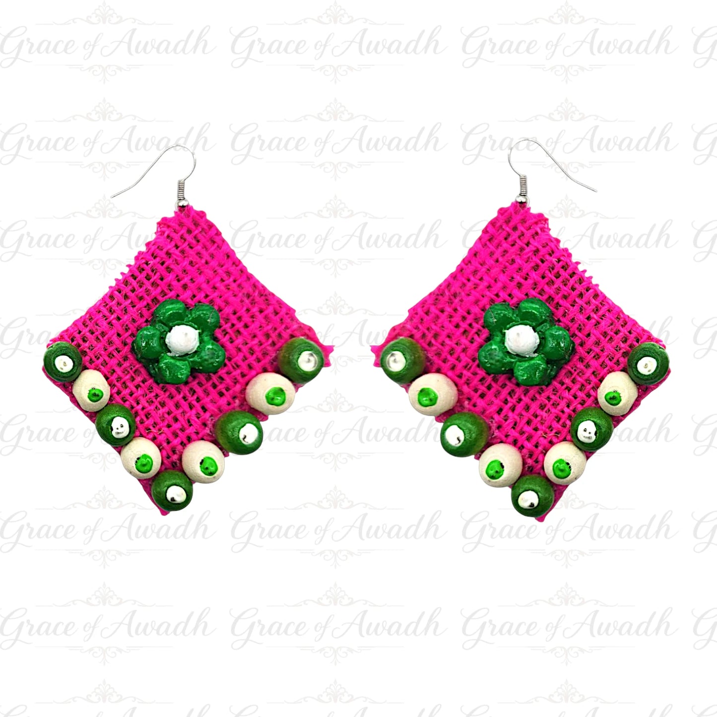 Pink earrings with green and white bead designs on a white background. Phool-e-Nazakat pink fabric earrings with green floral appliqué and beaded border – Grace of Awadh